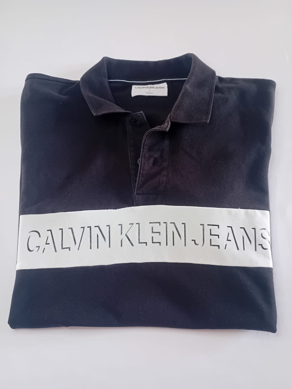Polo Calvin Klein Jeans marine à plat