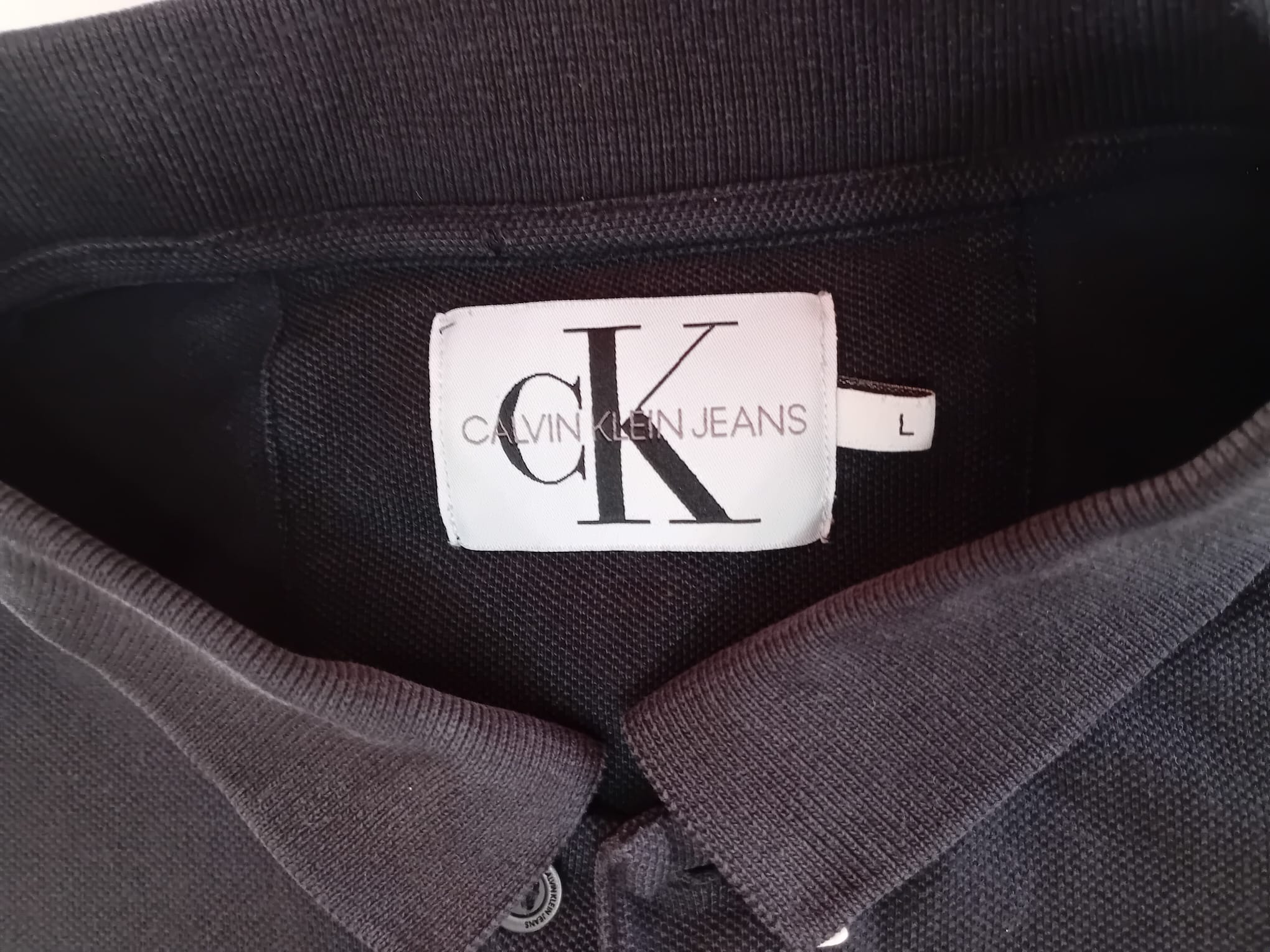 Étiquette Calvin Klein Jeans taille L