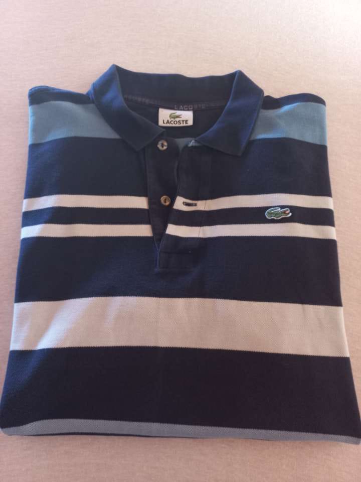 Polo Lacoste rayé marine blanc bleu ciel plié - vue face