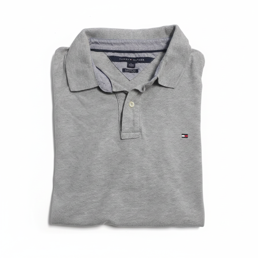 Polo Tommy Hilfiger gris chiné plié fond blanc