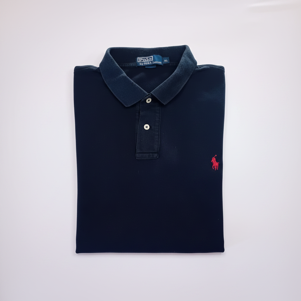 Polo bleu marine XL bien plié fond blanc
